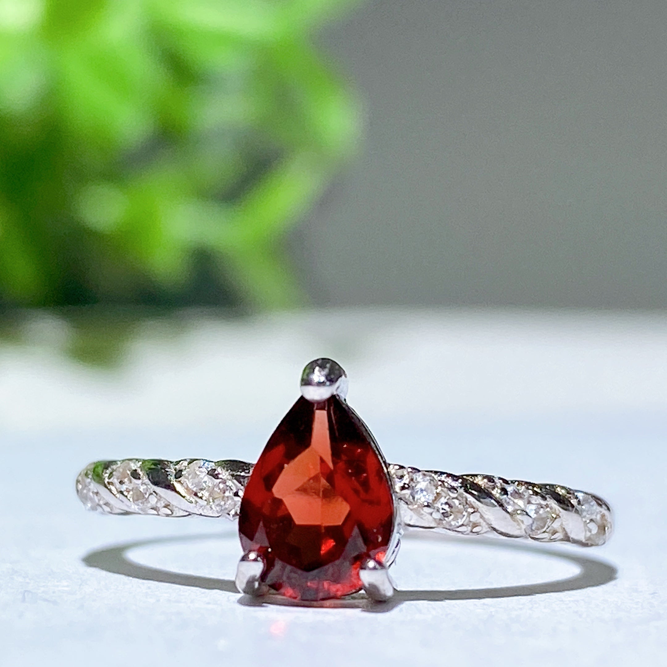 Adjustable Sterling Silver Garnet Ring with Opal Accent