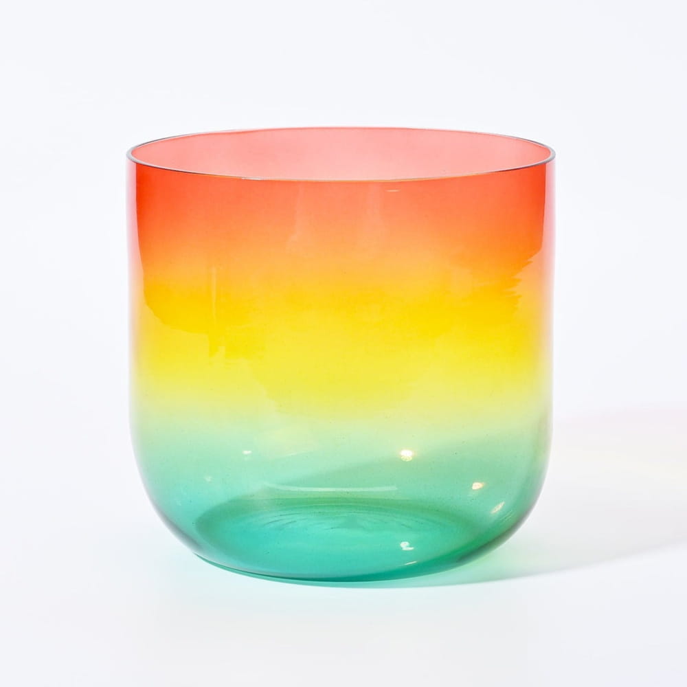 Rainbow-colored glass vessel in the Alchemy Clear Rainbow C Note Crystal Singing Bowl