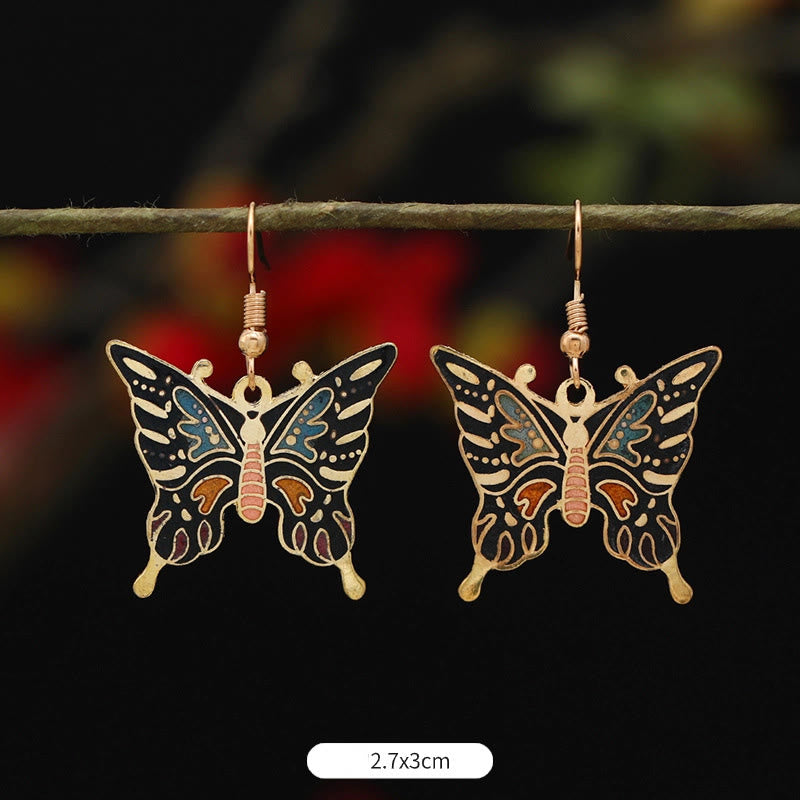 Boucles d'oreilles pendantes en alliage de cuivre et papillon lotus pour l'éveil spirituel