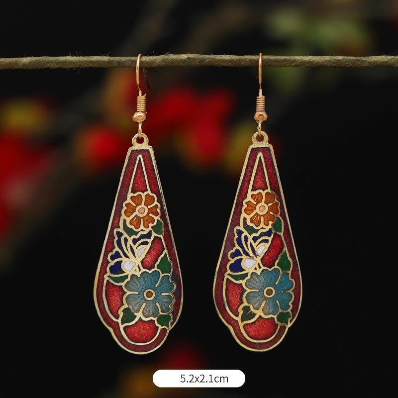 Boucles d'oreilles pendantes en alliage de cuivre et papillon lotus pour l'éveil spirituel