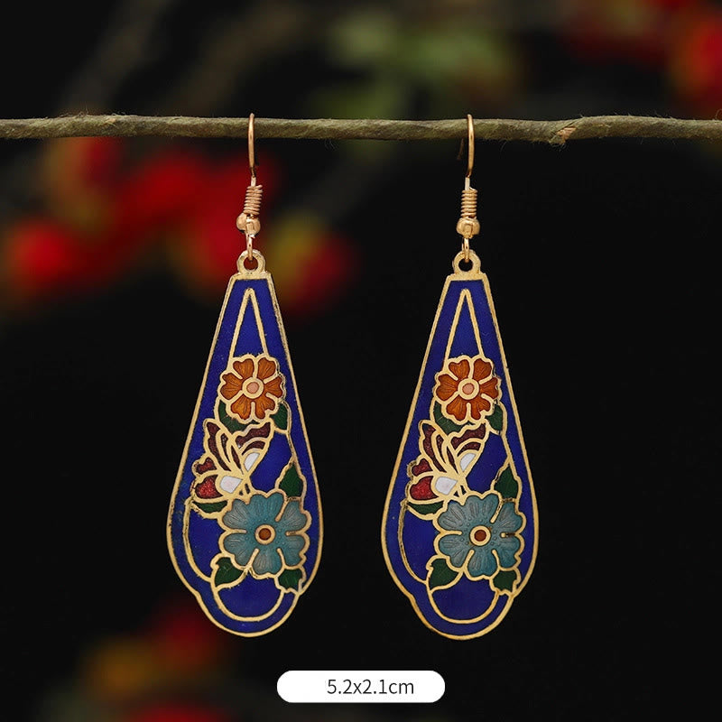 Boucles d'oreilles pendantes en alliage de cuivre et papillon lotus pour l'éveil spirituel