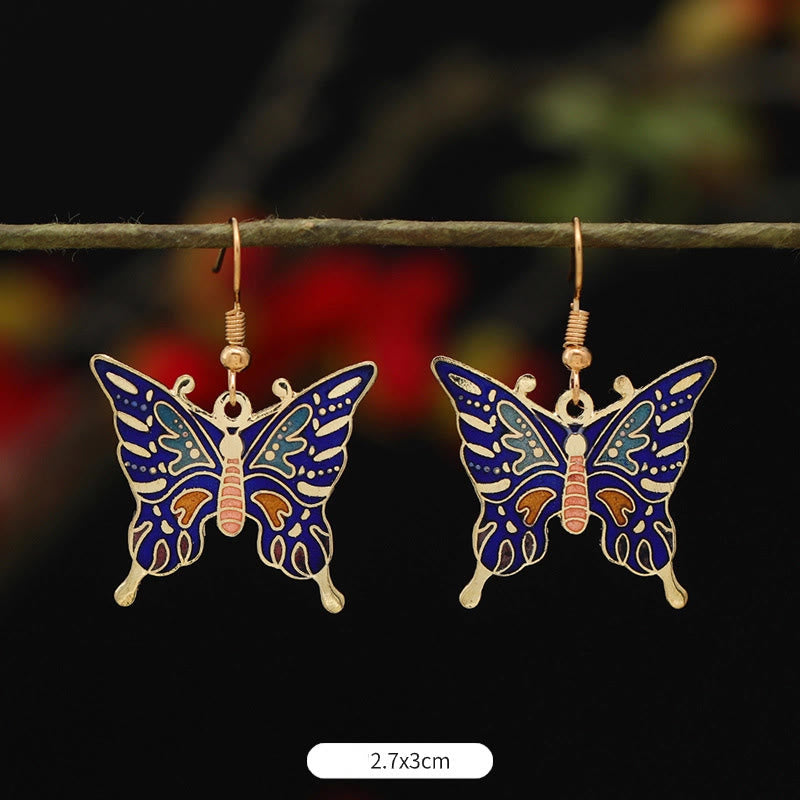 Boucles d'oreilles pendantes en alliage de cuivre et papillon lotus pour l'éveil spirituel