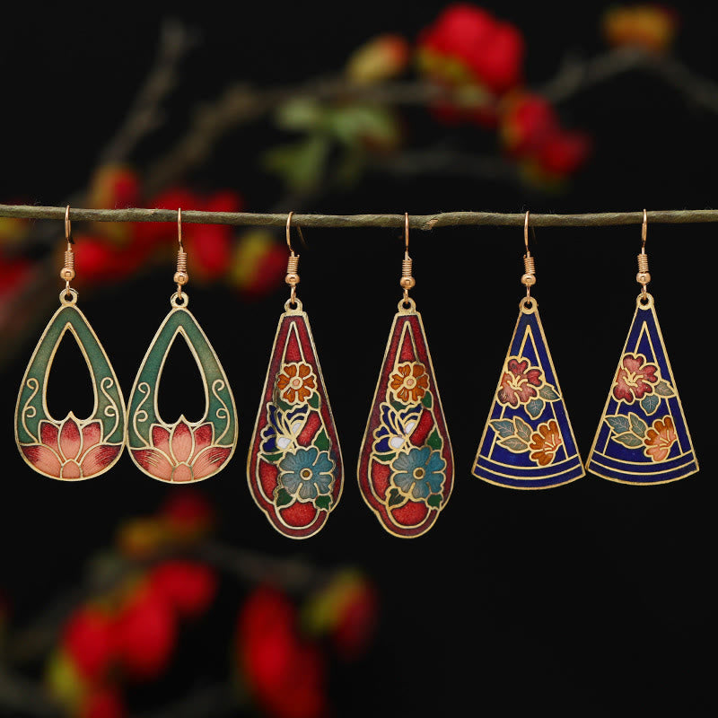 Boucles d'oreilles pendantes en alliage de cuivre et papillon lotus pour l'éveil spirituel