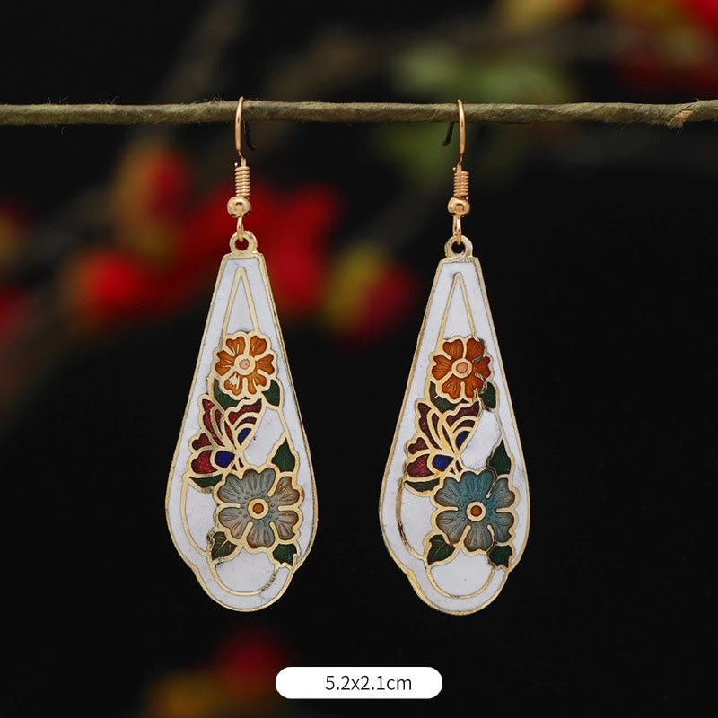 Boucles d'oreilles pendantes en alliage de cuivre et papillon lotus pour l'éveil spirituel