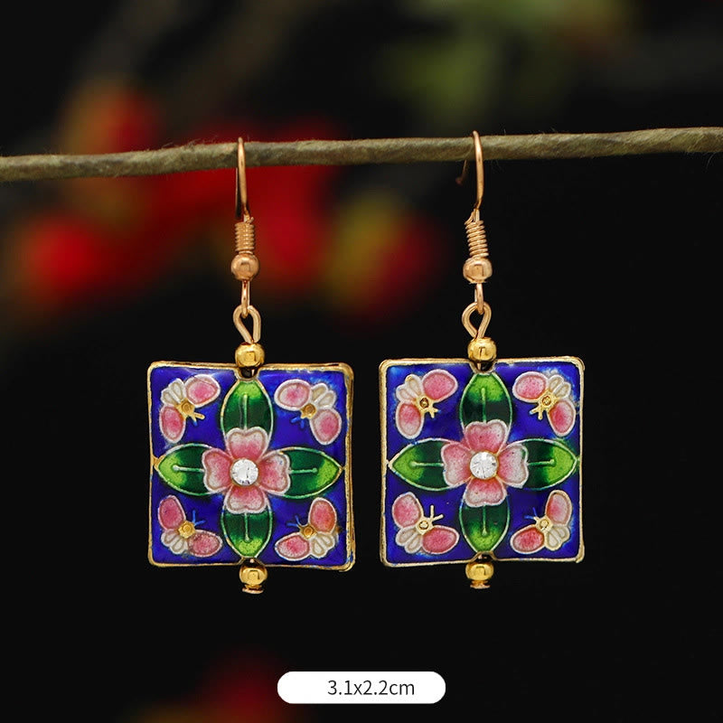 Boucles d'oreilles pendantes en alliage de cuivre et papillon lotus pour l'éveil spirituel