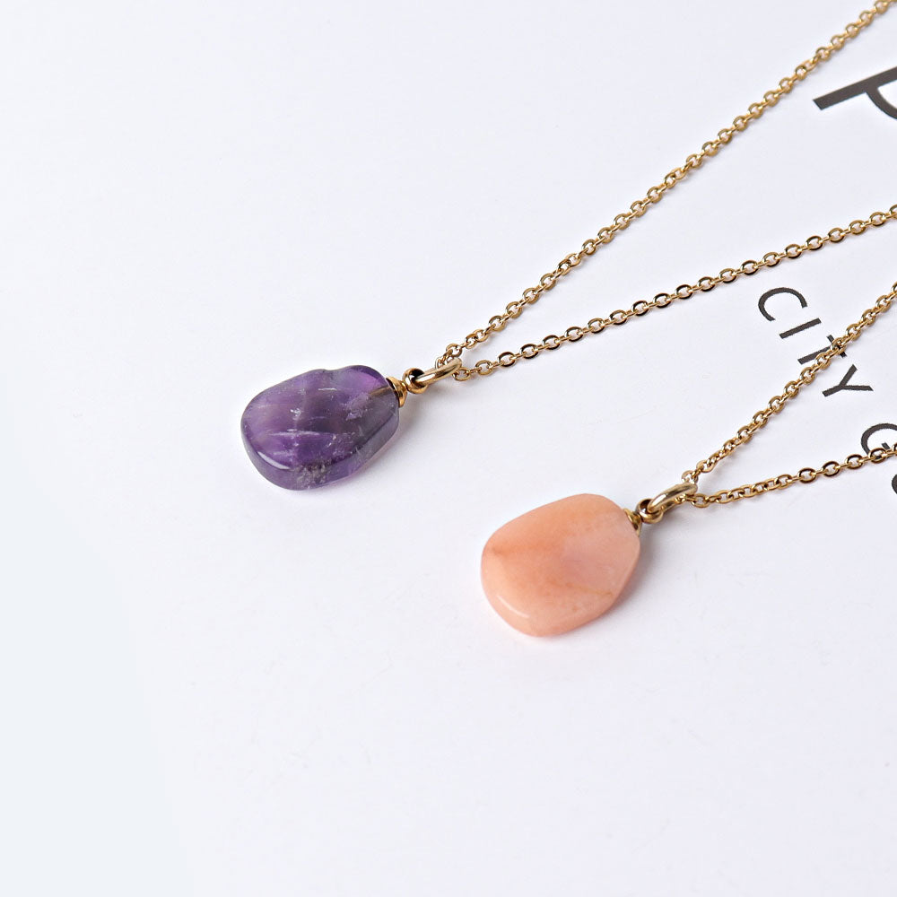 Collier en améthyste pêche et aventurine avec breloque croix dorée