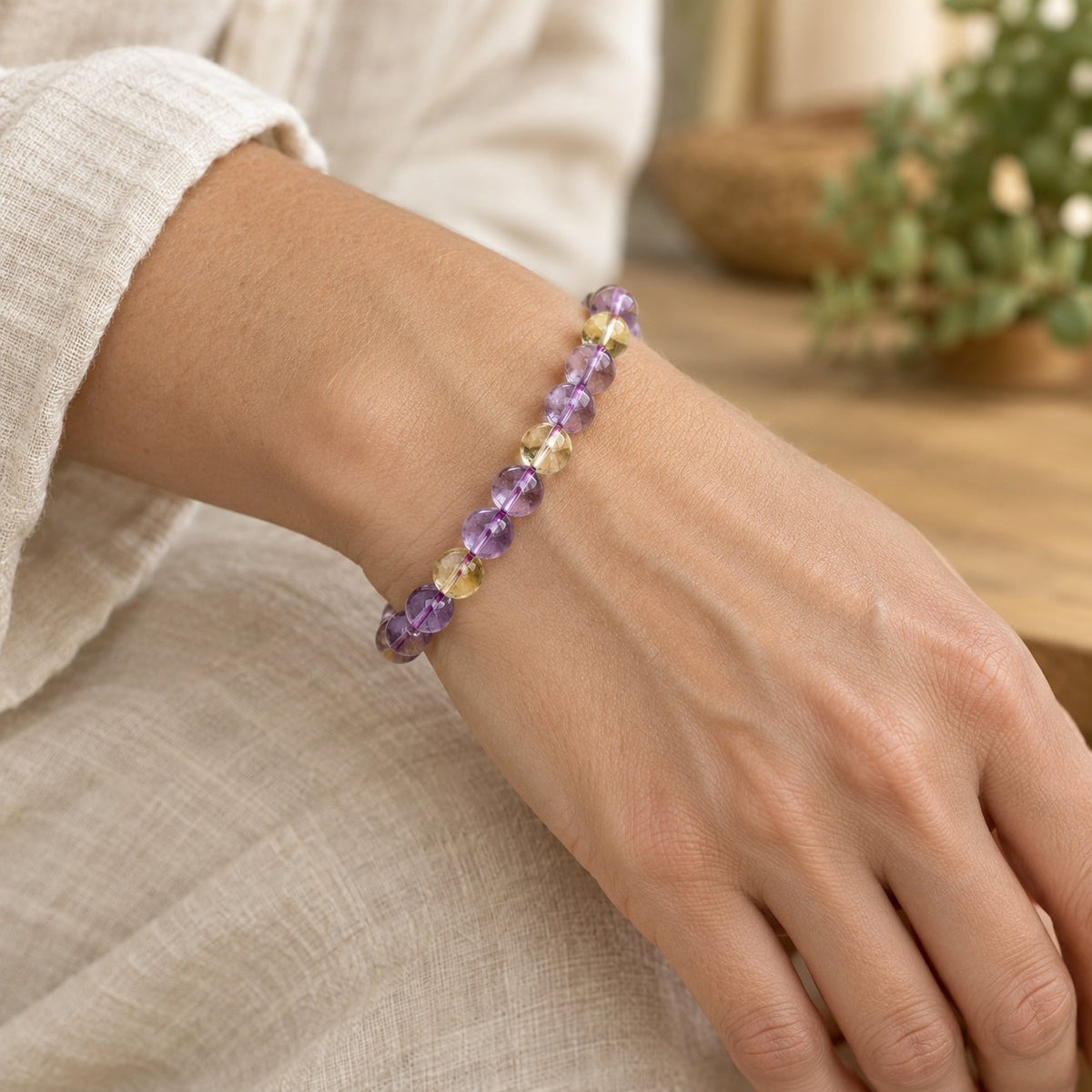 8.5mm Ametrine Healing Bracelet for Spiritual Protection, worn on the wrist by a woman