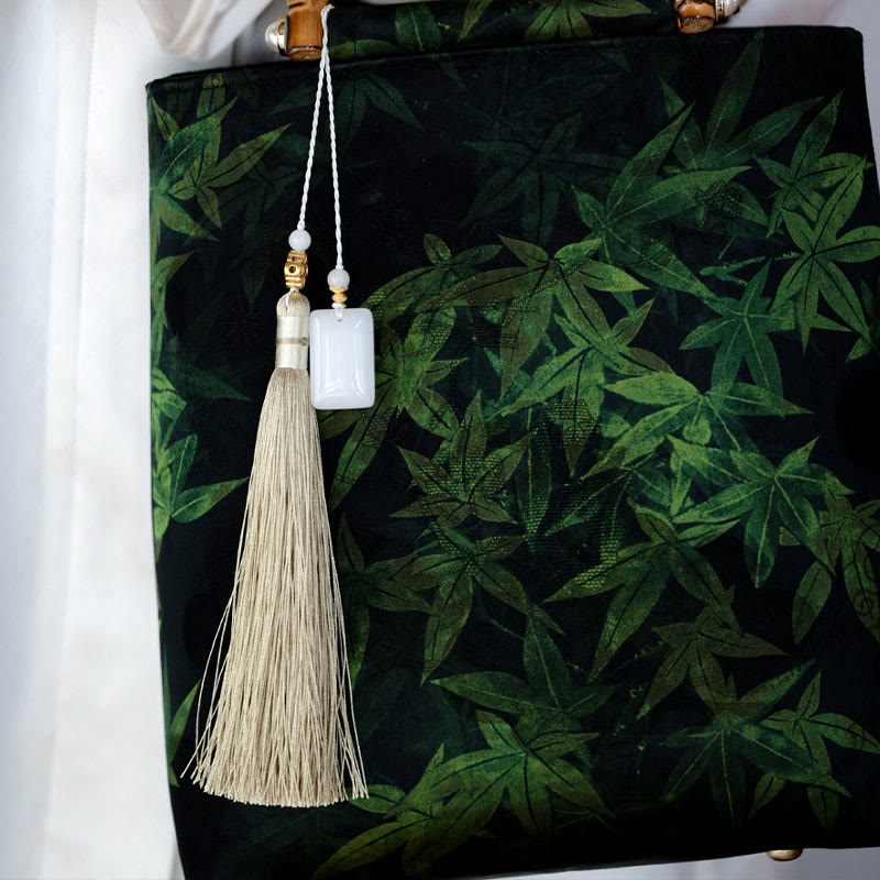 Sac à main en bambou avec motif papillon et poisson koï et poignées en jade