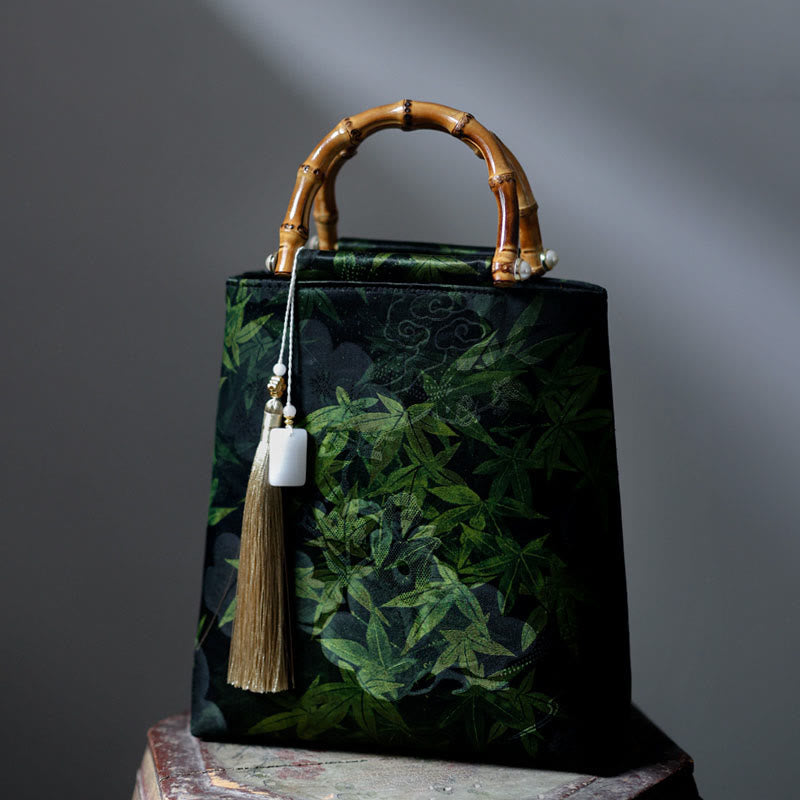 Sac à main en bambou avec motif papillon et poisson koï et poignées en jade