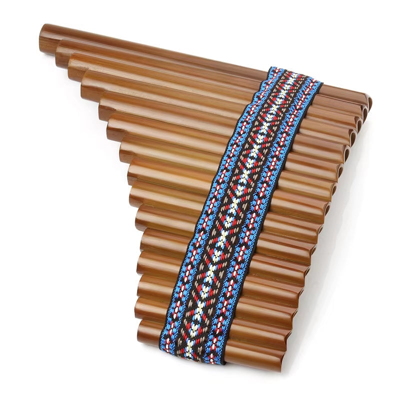 Bamboo Pan Flute G Key with geometric patterned fabric band in blue, red, and white