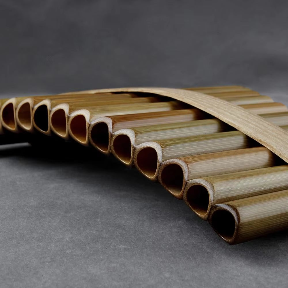 Curved Bamboo Pan Flute in G Key, featuring handmade hollow tubes arranged in a row