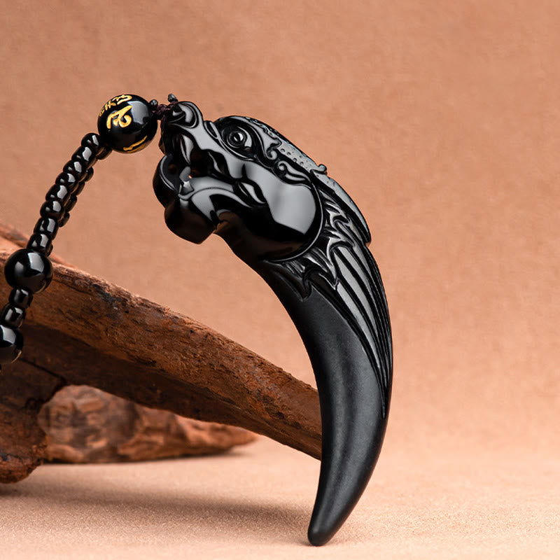 Collier dragon en jade noir pour la protection et l'énergie calme