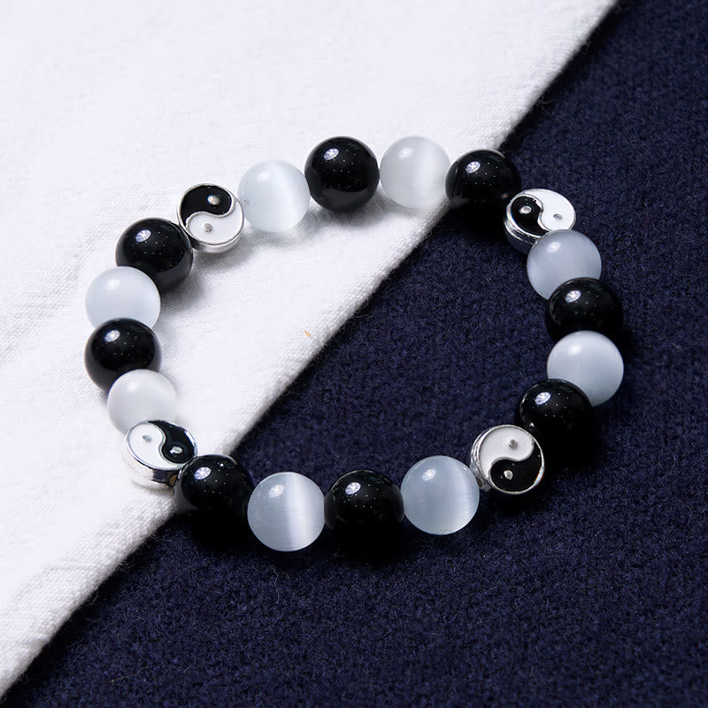 Bracelet Yin Yang en obsidienne noire œil de chat pour la purification et la force
