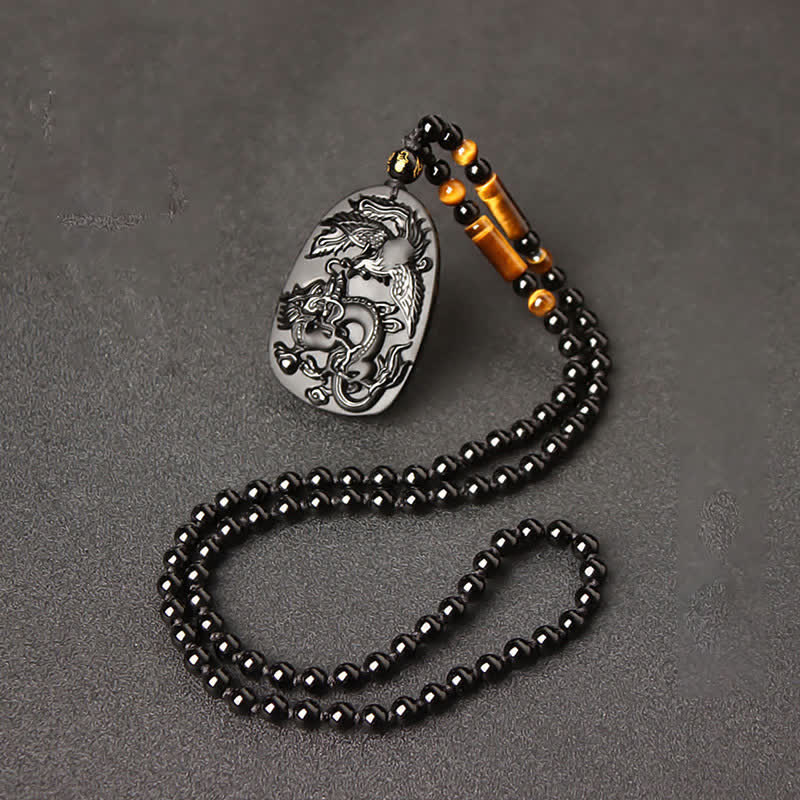 Collier dragon en obsidienne noire avec pendentif œil de tigre pour la protection