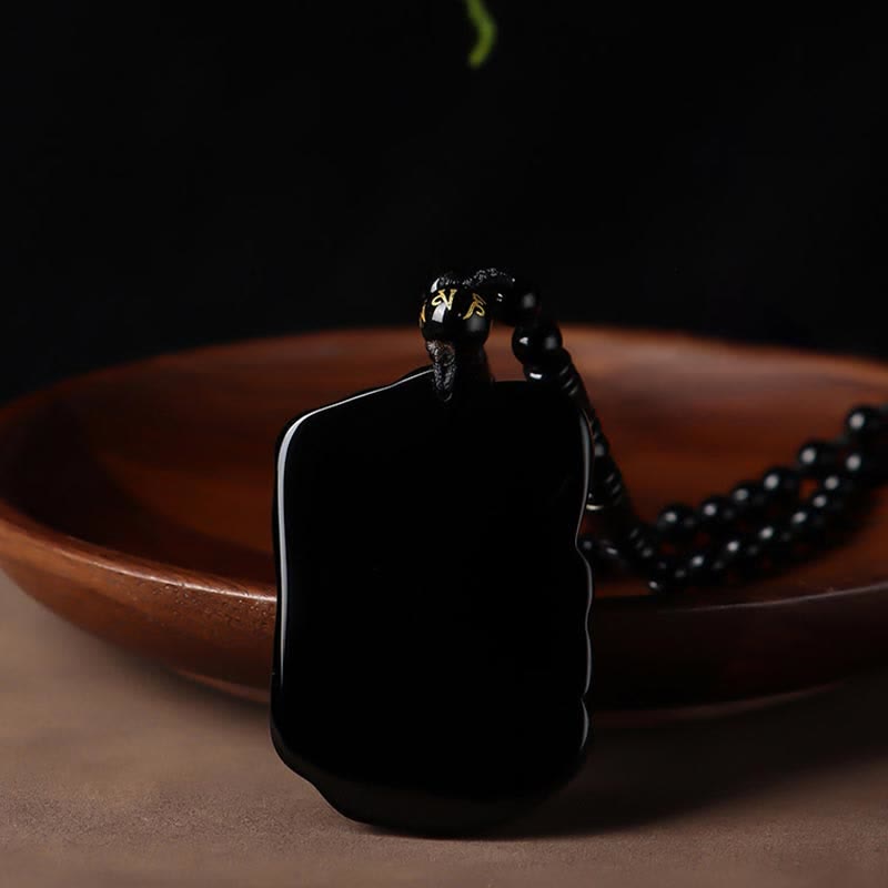 Collier éléphant en obsidienne noire pour la protection et la force