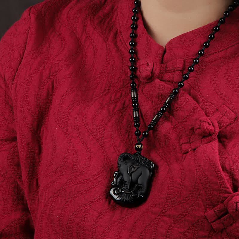 Collier éléphant en obsidienne noire pour la protection et la force