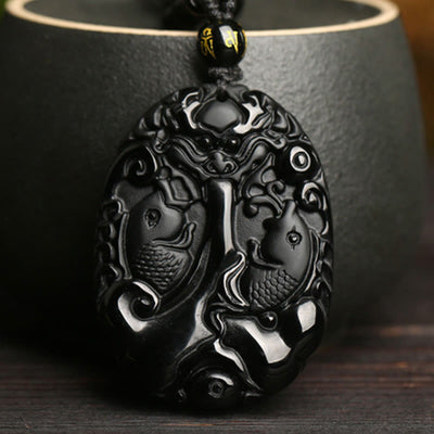 Collier pendentif poisson koï en obsidienne noire pour la force et l'épanouissement