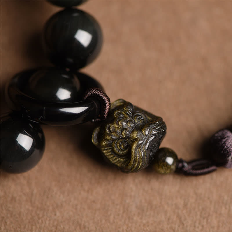 Mala de poignet en obsidienne noire avec lion pour la protection et le courage