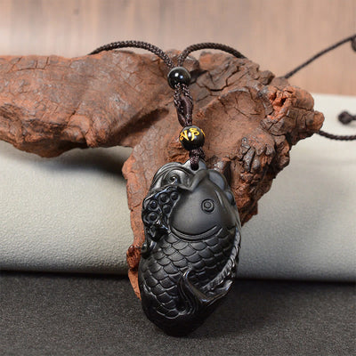 Collier pendentif en obsidienne noire avec symbole amphioxus