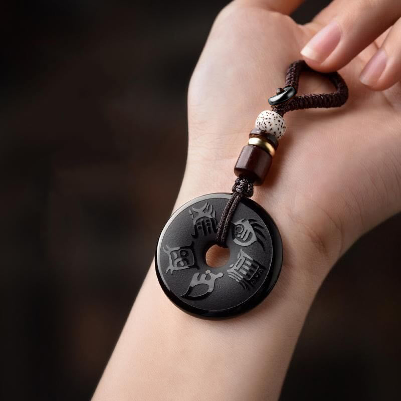 Collier en obsidienne noire avec boucle de paix et pendentif des cinq montagnes sacrées