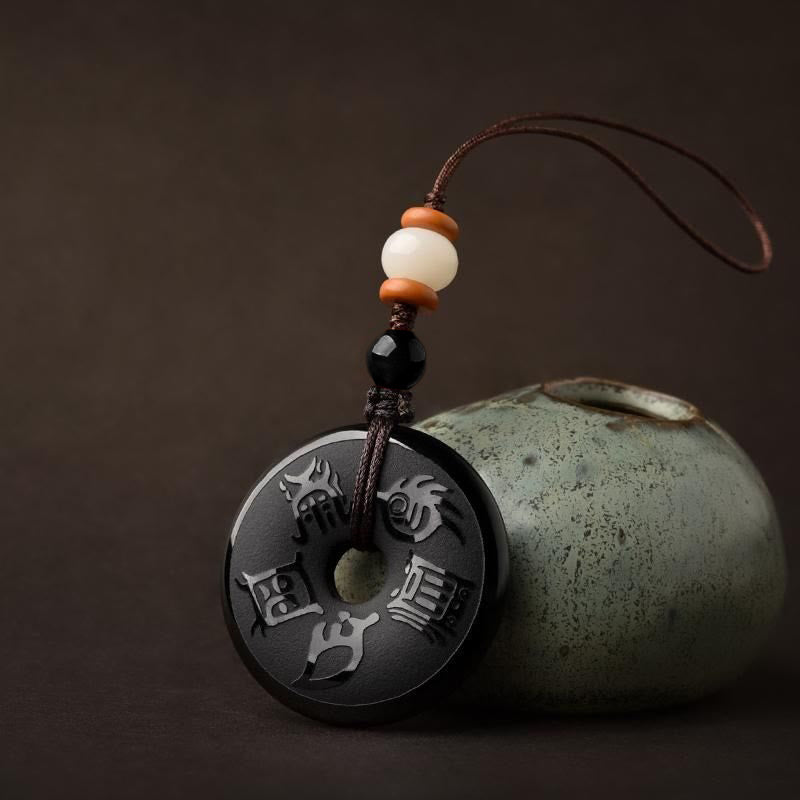 Collier en obsidienne noire avec boucle de paix et pendentif des cinq montagnes sacrées