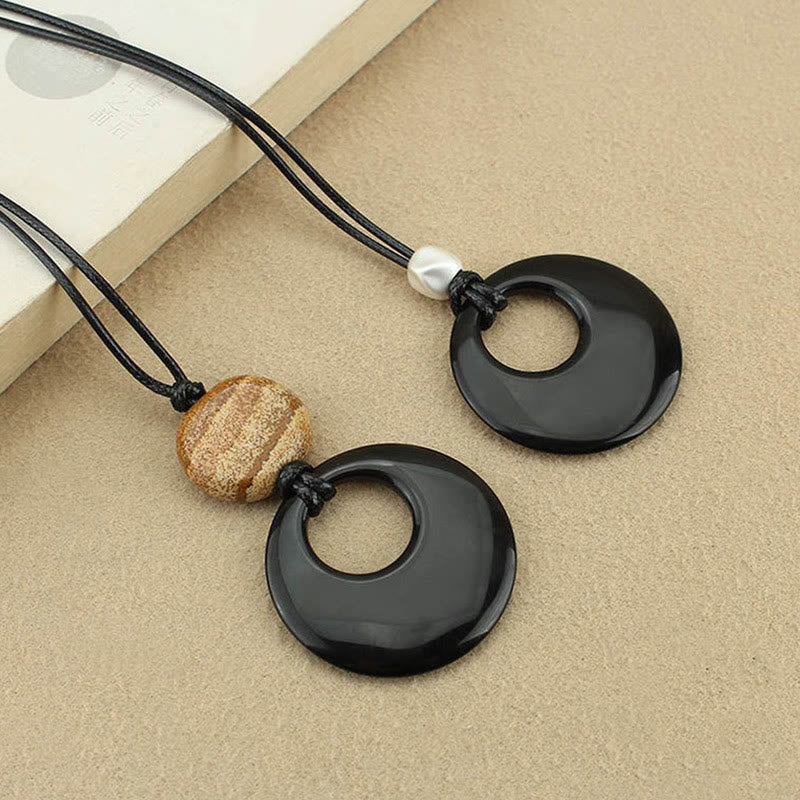 Collier pendentif en pierre d'obsidienne noire