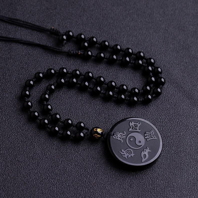 Collier pendentif force taoïste en obsidienne noire