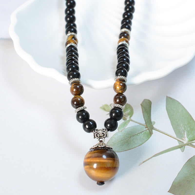 Collier en obsidienne noire œil de tigre pour la protection et la force