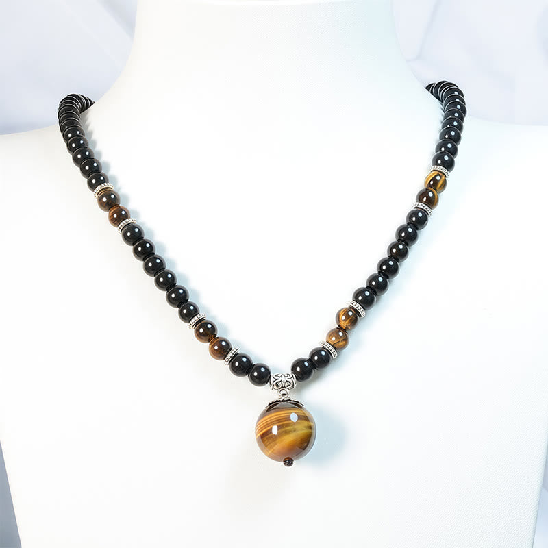 Collier en obsidienne noire œil de tigre pour la protection et la force