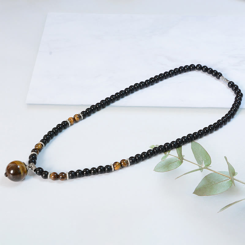 Collier en obsidienne noire œil de tigre pour la protection et la force