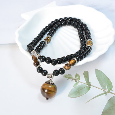 Collier en obsidienne noire œil de tigre pour la protection et la force