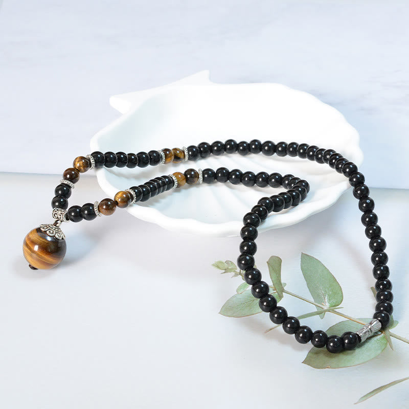 Collier en obsidienne noire œil de tigre pour la protection et la force