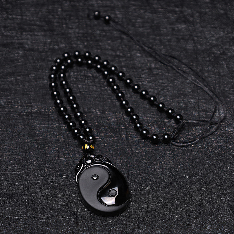 Collier pendentif Yin Yang en obsidienne noire, symbole de la force et de l'accomplissement