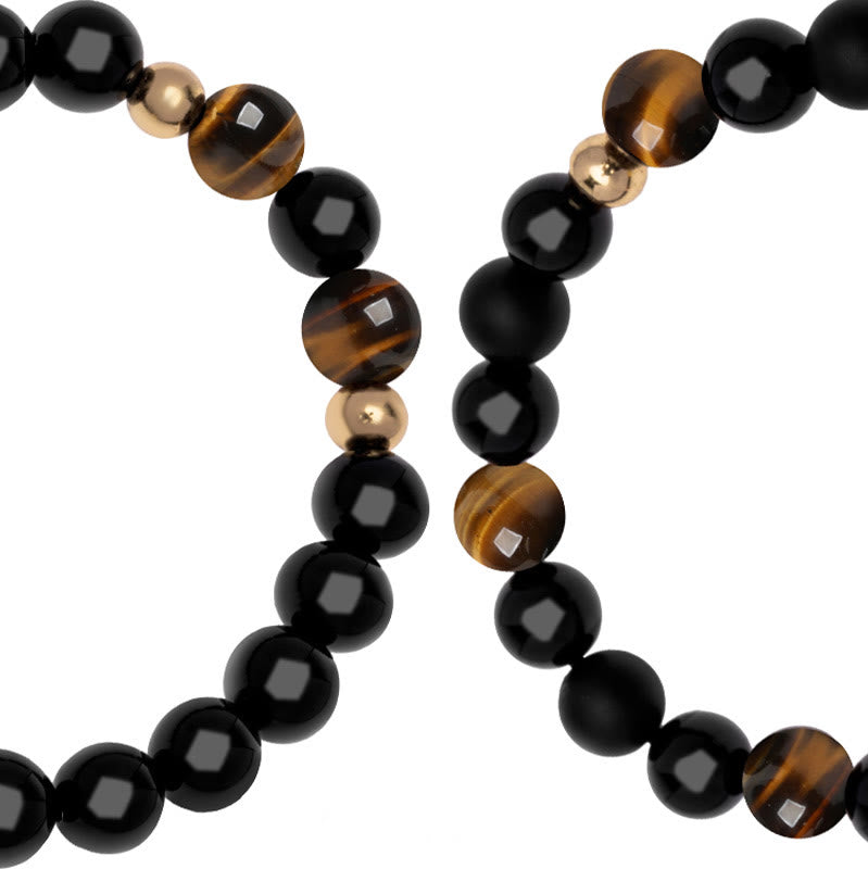 Bracelet de protection en onyx noir et œil de tigre avec perle de lion
