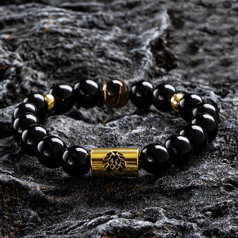 Bracelet de protection en onyx noir et œil de tigre avec perle de lion