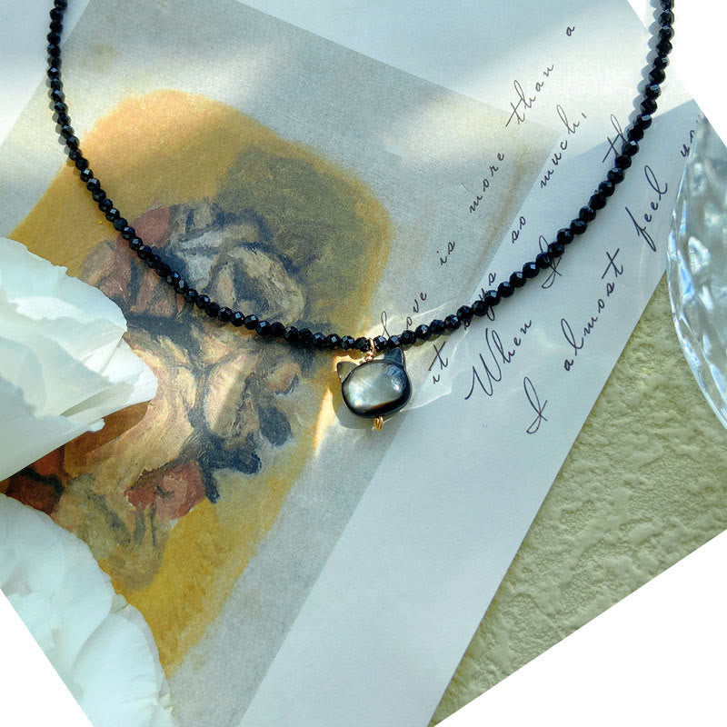 Collier ras du cou motif chat spinelle noir 38 cm