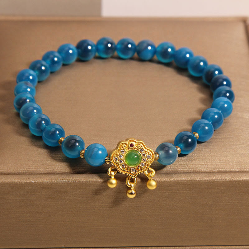 Bracelet en agate bleue avec breloque cadenas chinois pour la protection