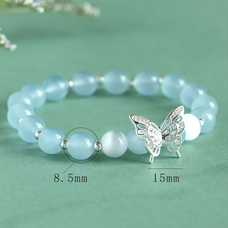 Bracelet spirituel énergétique en calcédoine bleue et papillon