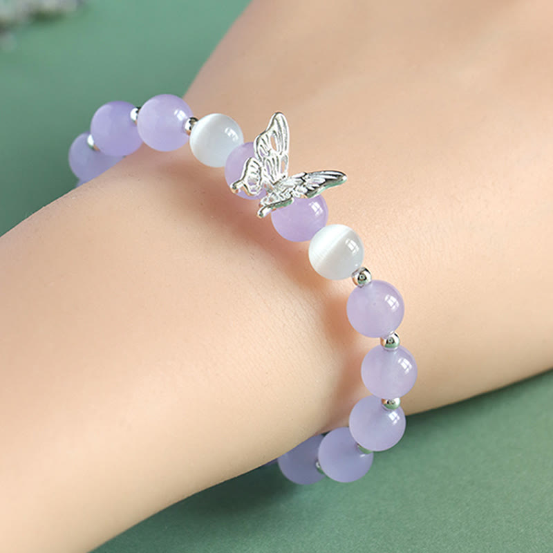 Bracelet spirituel énergétique en calcédoine bleue et papillon