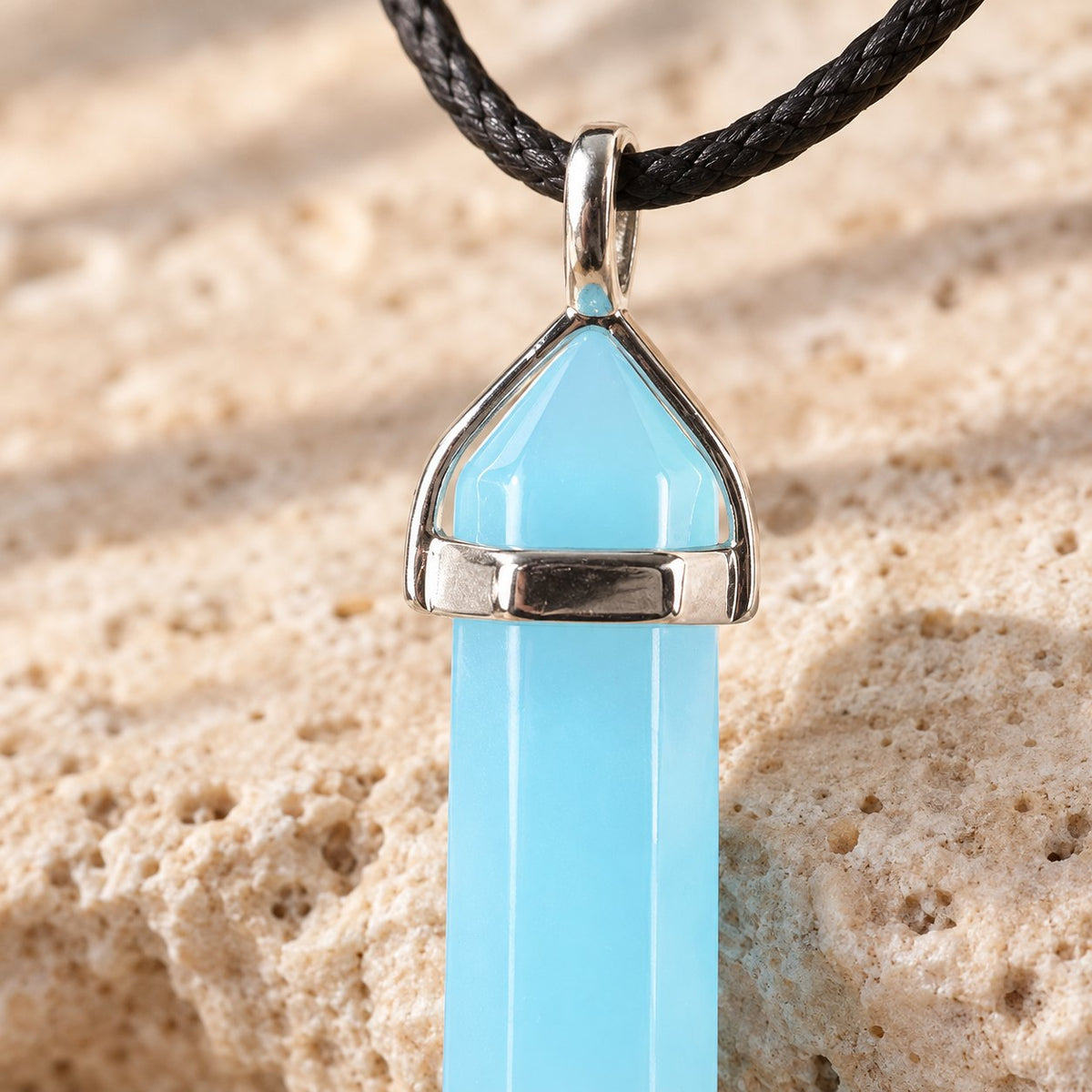 Blue Luminous Spiritual Pendant 1-1/2 inch Healing Crystal, close-up of the material and finish