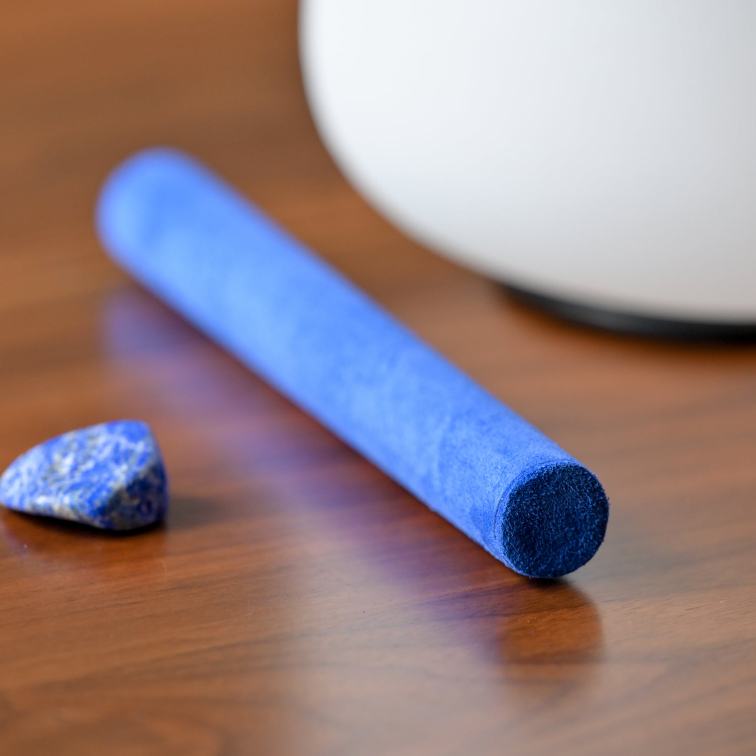 Blue chalk stick beside a small piece of chalk for Blue Suede Mallet, Crystal Singing Bowl