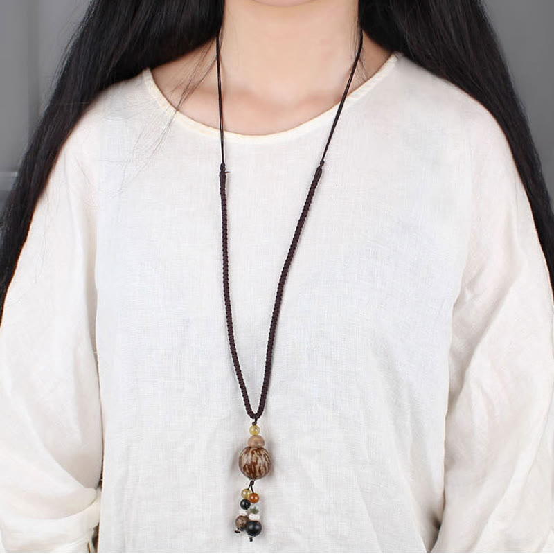 Collier de sagesse en graines de lotus Bodhi pour l'harmonie et l'illumination