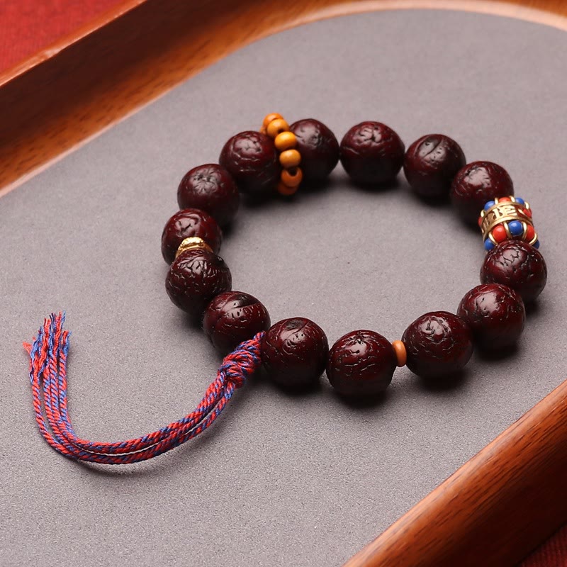 Bracelet Bodhi Seed Peace &amp; Calm avec pompon 15 mm