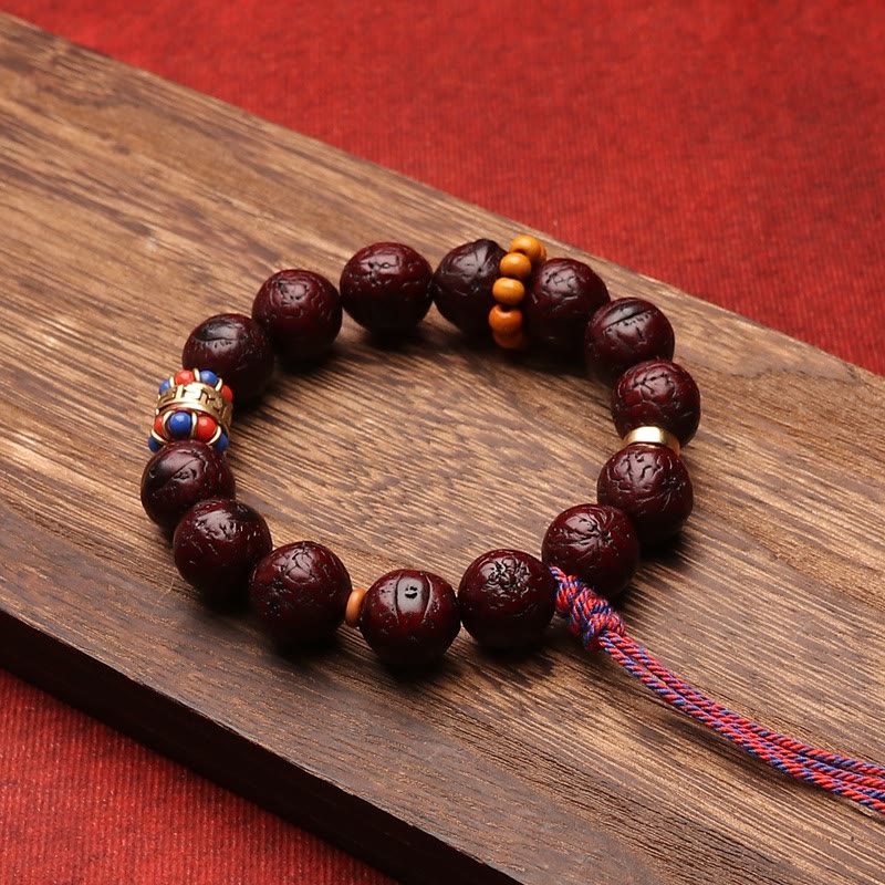 Bracelet Bodhi Seed Peace &amp; Calm avec pompon 15 mm