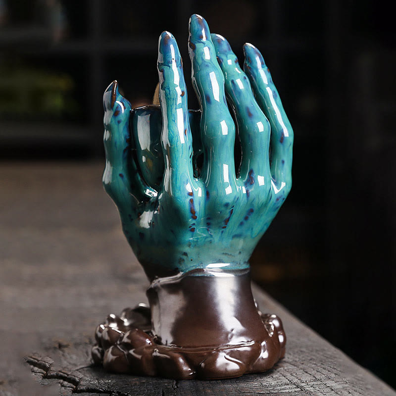 Brûleur d'encens en céramique marron, décoration de main de crâne