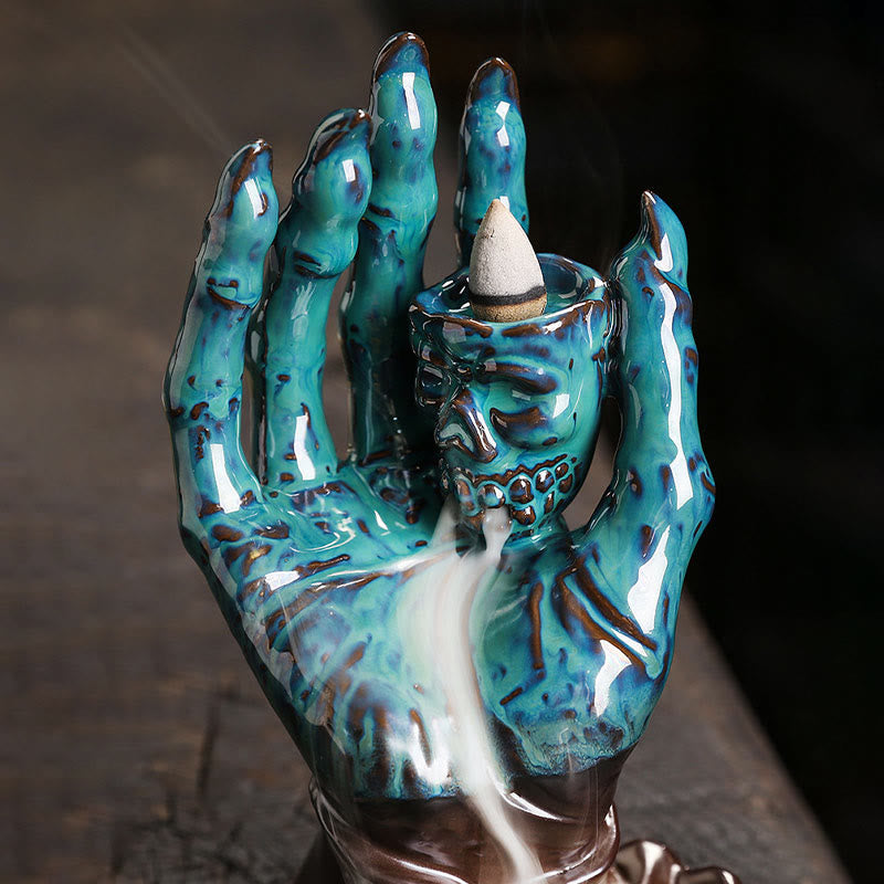 Brûleur d'encens en céramique marron, décoration de main de crâne