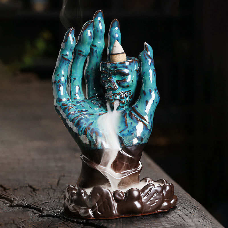 Brûleur d'encens en céramique marron, décoration de main de crâne