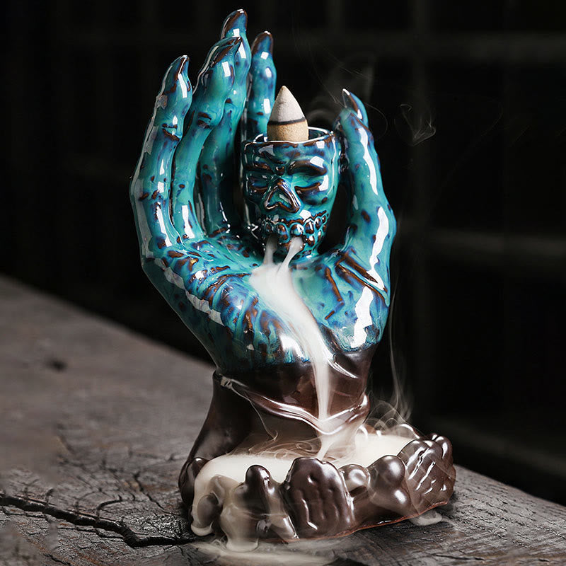 Brûleur d'encens en céramique marron, décoration de main de crâne