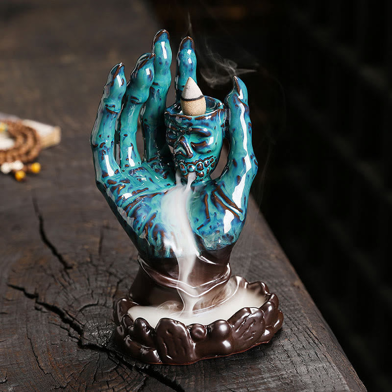 Brûleur d'encens en céramique marron, décoration de main de crâne
