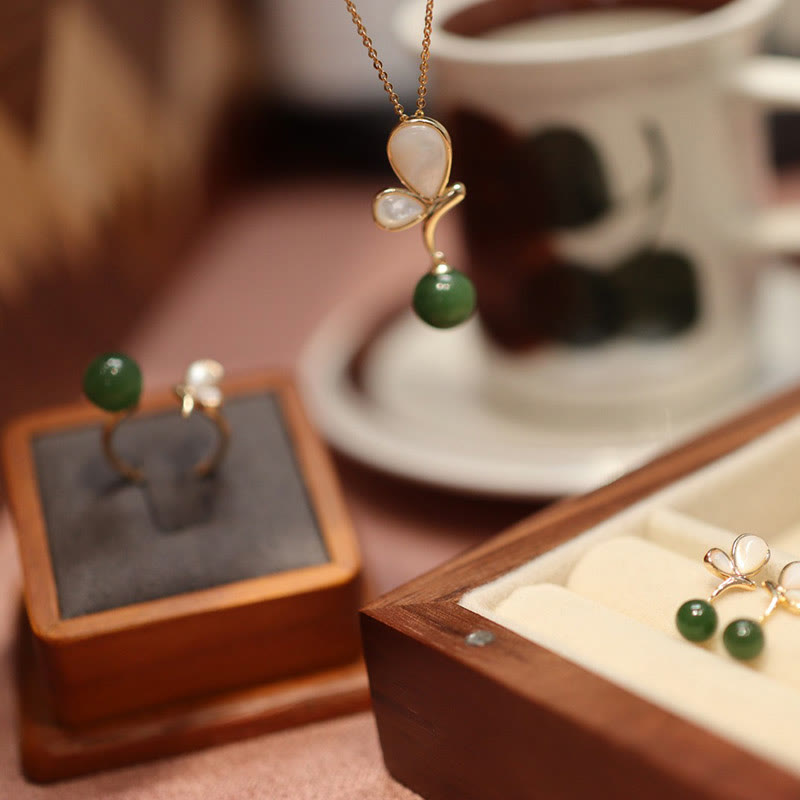 Ensemble de bijoux calmes en jade cyan et papillon tridacna